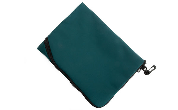 An A5 Ghost Whale Pouch in Seapine (bluish-green).